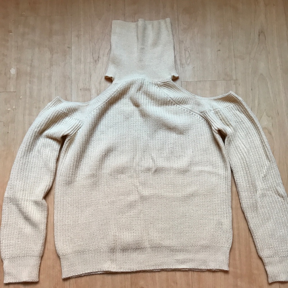 Kendall and Kylie open shoulder sweater.